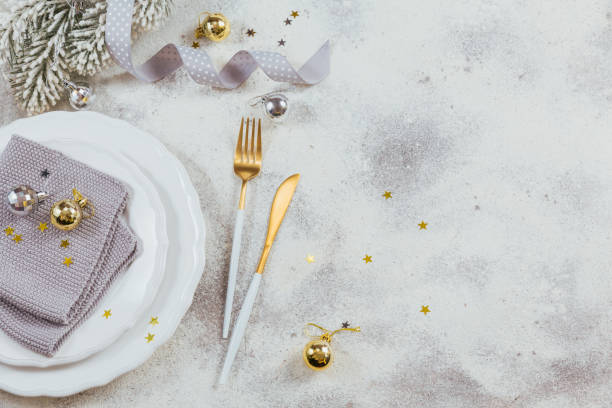istock Christmas creative composition with cutlery, Christmas gift, fir branches, decoration 1200538360