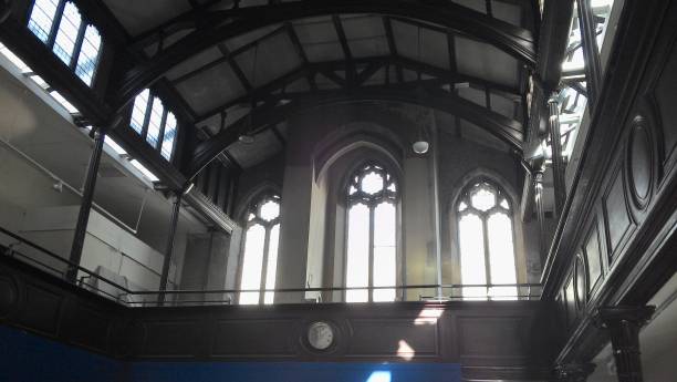 istock Church arch windows and beams in UK 1200548338