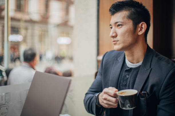 istock Young businessman is having coffee 1200551656