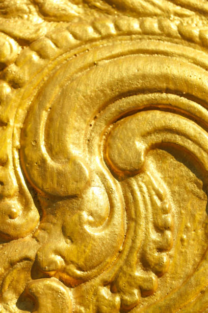 istock Golden Color Carved Wall Design Texture Suitable For Wallpaper Or Background 1200552736
