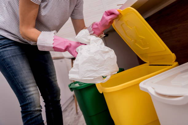 istock Young girl sorting garbage at the kitchen. Concept of recycling. Zero waste 1200553803