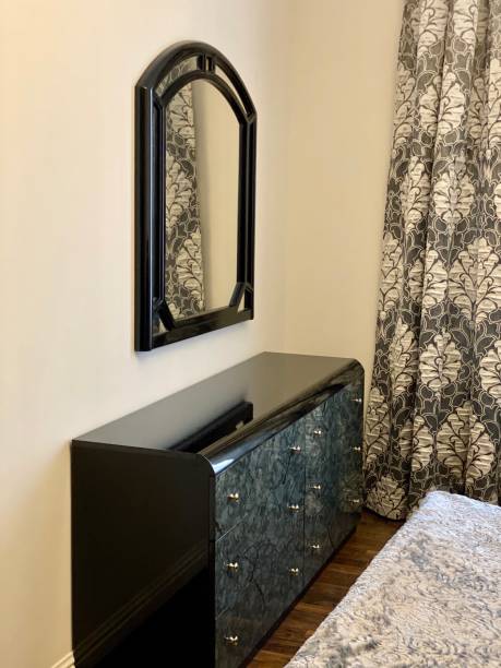 istock black nightstand and mirror in the bedroom 1200554197