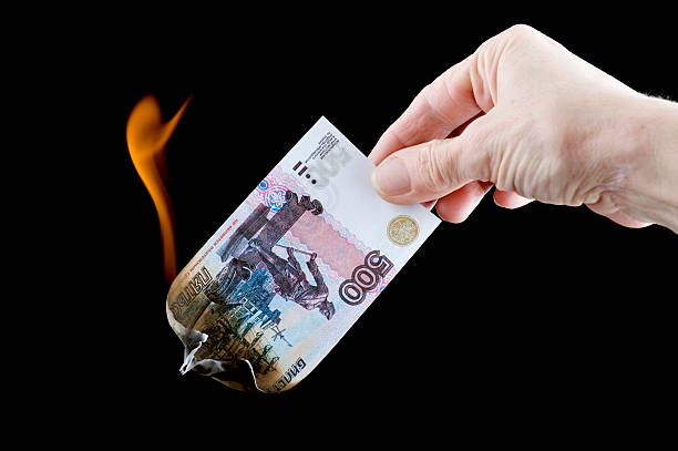 istock burning paper currency close up 120055613