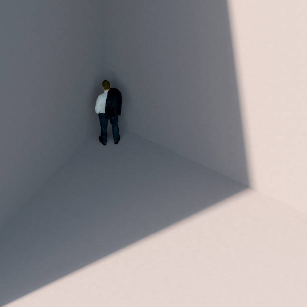 istock Embarrassed businessman standing in corner 1200558660