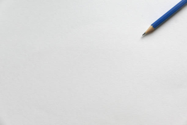 istock Pencil on white paper background. Copy paste for text, logo and etc. 1200559357