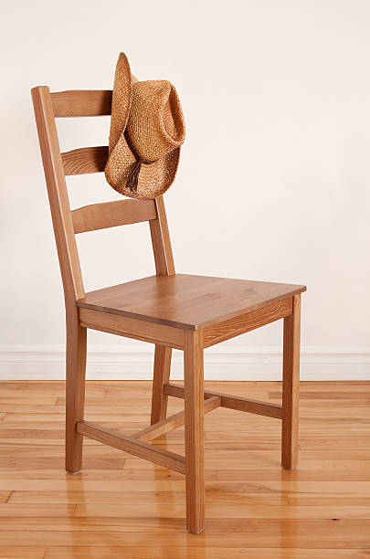 istock Cowboy hat on a wooden chair 120056749