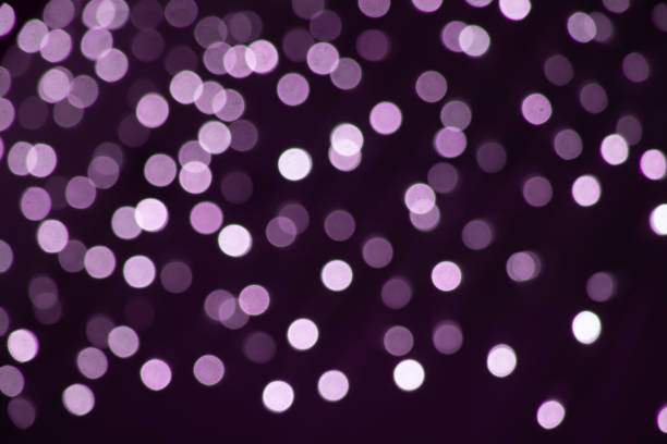 istock Abstract beautiful blurred background with a group of pink circles from lighted lamps can be used for a decoration 1200568122
