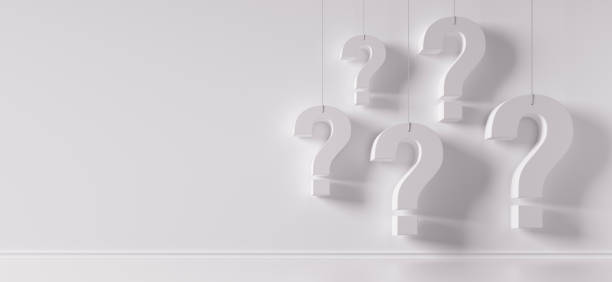 White Question Mark in Front of white Wall Five white hanging Question Marks In Front of a  white Wall with copy space frequently asked questions stock pictures, royalty-free photos & images
