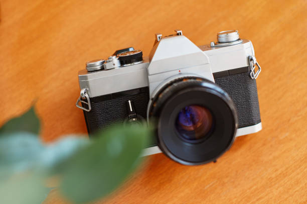 istock Professional vintage SLR analog film camera 1200569649