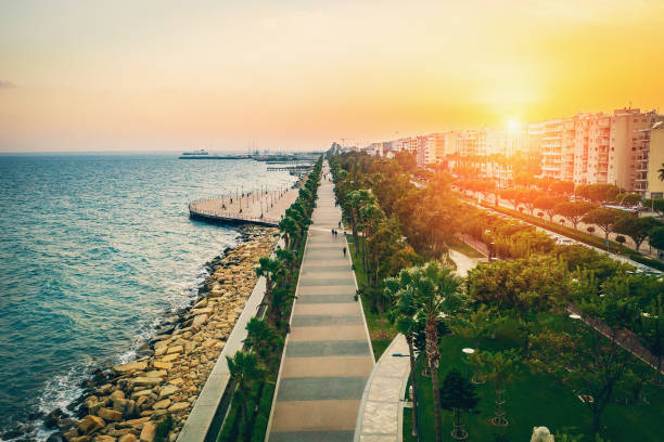 Molos Promenade on Limassol City coast in Cyprus at Sunset, Aerial View from Drone Molos Promenade on Limassol City coast in Cyprus at Sunset, Aerial View from Drone. limassol marina stock pictures, royalty-free photos & images