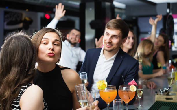 istock Portrait of young  office workers with champagne 1200571651