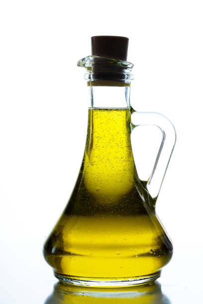 fresh and delicious olive oil, natural olive oil on white background - olive oil pouring antioxidant liquid imagens e fotografias de stock