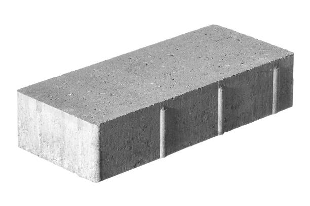 istock Paving stone made of concrete isolated on white background. Tile has a flat upper surface without chamfer and fit snugly when paving. 1200572286