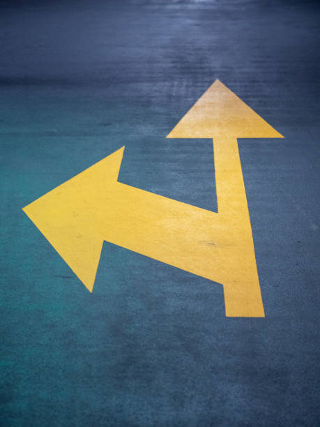 istock Yellow Arrow Marking on the Road 1200574163