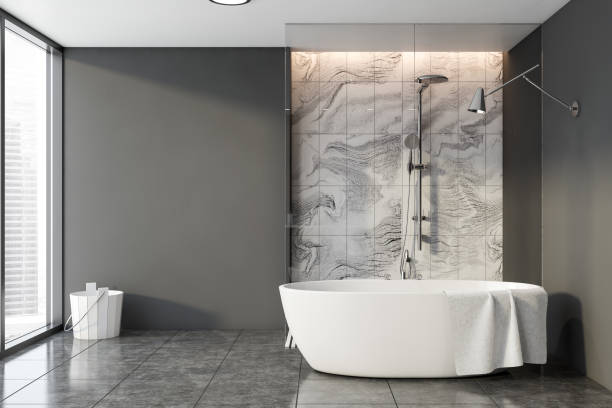 istock Gray and marble bathroom, shower and tub 1200575564