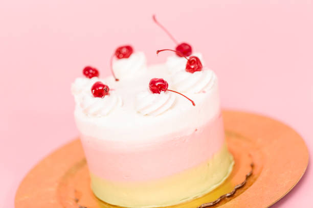 istock Birthday Spumoni cake on pink background. 1200575830