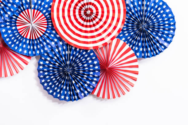 istock Red, white, and blue paper fans for July 4th celebration. 1200575833