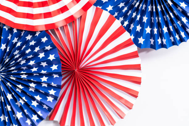 istock Red, white, and blue paper fans for July 4th celebration. 1200575892