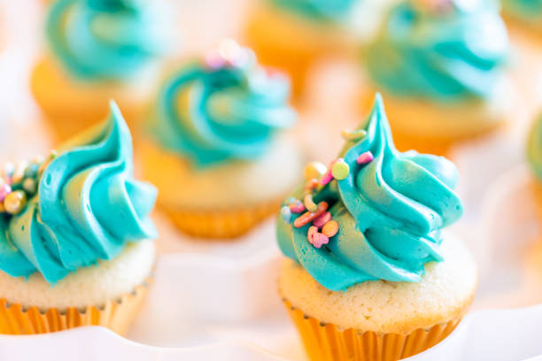 Colorful bright cupcakes are prepared at home