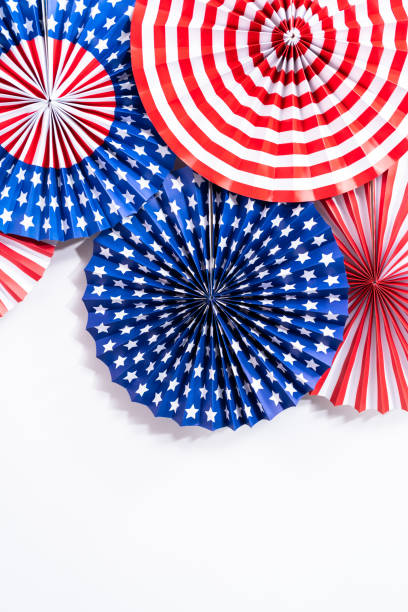 istock Red, white, and blue paper fans for July 4th celebration. 1200576091