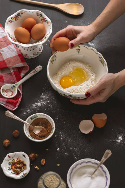 istock View from above female's hands kneading dough 1200576154