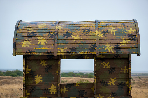 A military camouflage pattern is painted on a bus stop at Tigranakert, Nagorno-Karabakh. In the late 1980s and especially in the early 1990s, Nagorno-Karabakh was convulsed by war as Armenians and Azerbaijanis fought over control for the territory. Populated mostly by Armenians, since 1991 it has been a de facto independent state, calling itself the Republic of Artsakh. Internationally, however, it is still recognized as belonging to Azerbaijan. The conflict continues to simmer today.