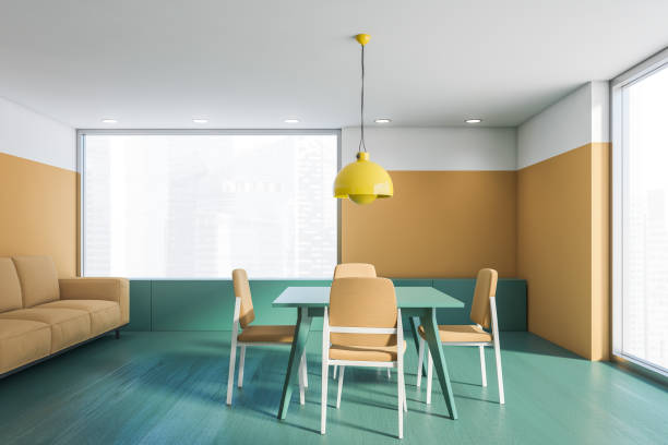 istock Beige and green dining room interior with sofa 1200577582