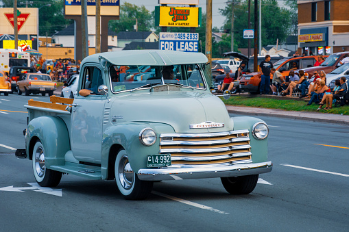 Moncton, New Brunswick, Canada - July 11, 2015 : 1951 Chevy 3100 pickup cruising Saturday evening on Mountain Road during 2015 Atlantic Nationals Automotive Extravaganza.