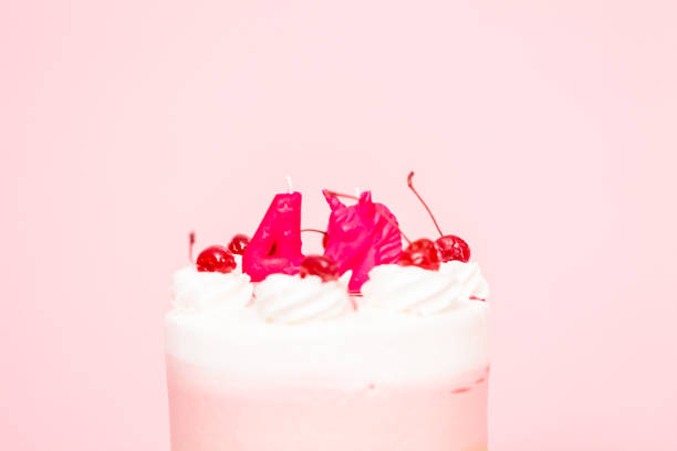Birthday Spumoni cake on pink background.