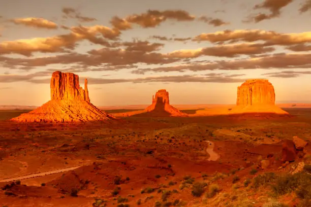 Photo of Monument Valley, twice a year the shadow is casted on middle butte. Rare spactacle