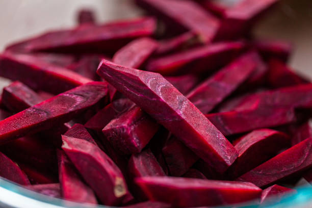 istock Sliced organic beets in a glass bowl to make borscht. 1200583308