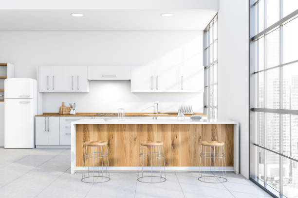 istock Stylish white kitchen with wooden bar 1200583492
