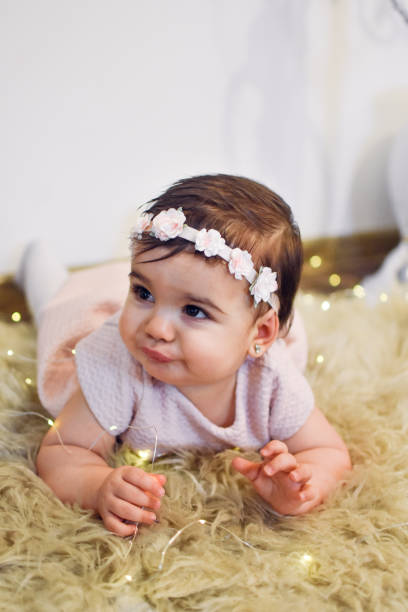 istock Cute Baby Girl 1200584184