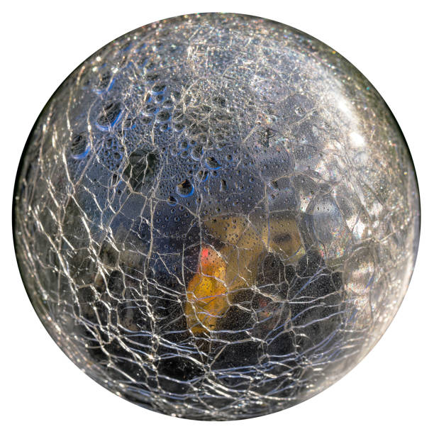 istock Cracked crystal ball glass sphere future uncertainty 1200584219