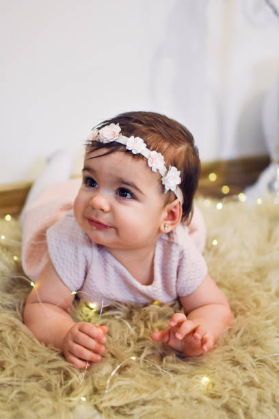 istock Cute Baby Girl 1200584300