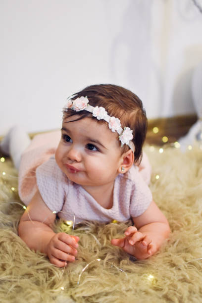 istock Cute Baby Girl 1200584334