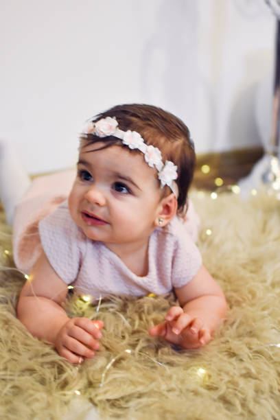istock Cute Baby Girl 1200584360