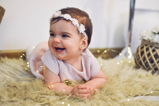 istock Cute Baby Girl 1200584656