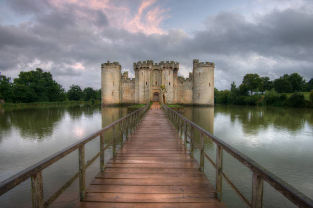 Sunset at Bodiam Castle in East Sussex England Taken at Bodiam Castle located in East Sussex England. drawbridge photos stock pictures, royalty-free photos & images