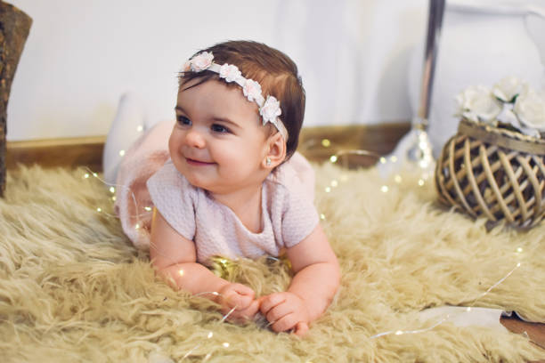 istock Cute Baby Girl 1200584713