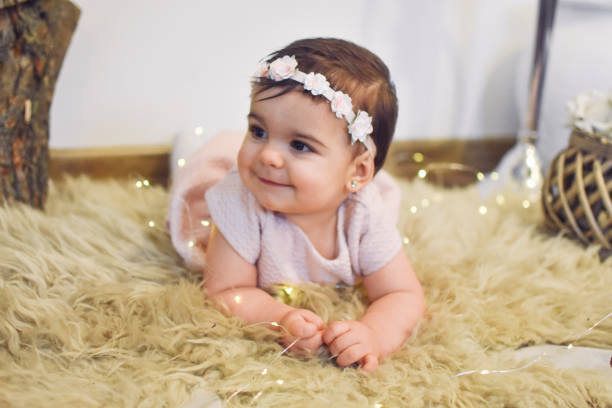 istock Cute Baby Girl 1200584875