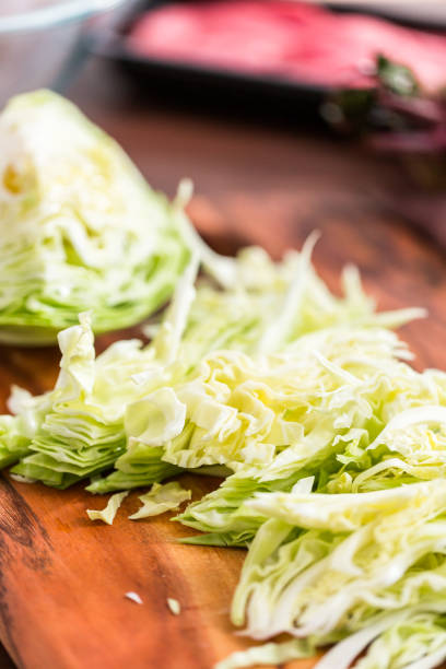 istock Shredded green cabbage to make beet soup. 1200586107