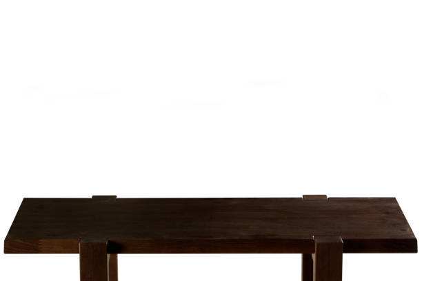 istock Dark Wooden tabletop on white background. Empty wood table. 1200591552