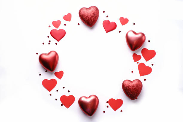istock Creative greeting card with red heart decorations 1200594183
