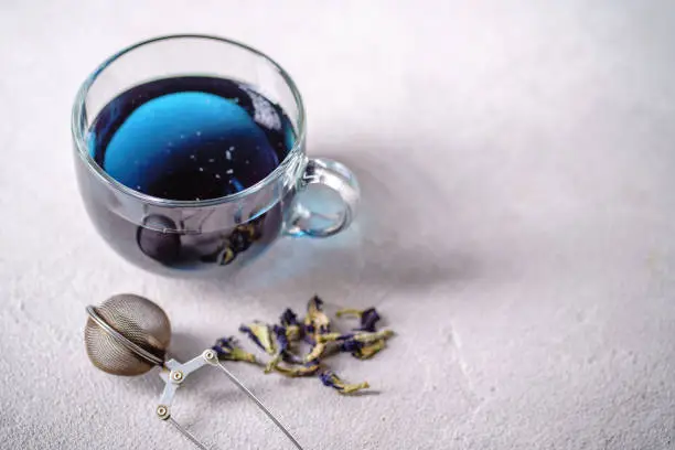 Photo of Pea tea, butterfly blue tea in glass mug, anchan