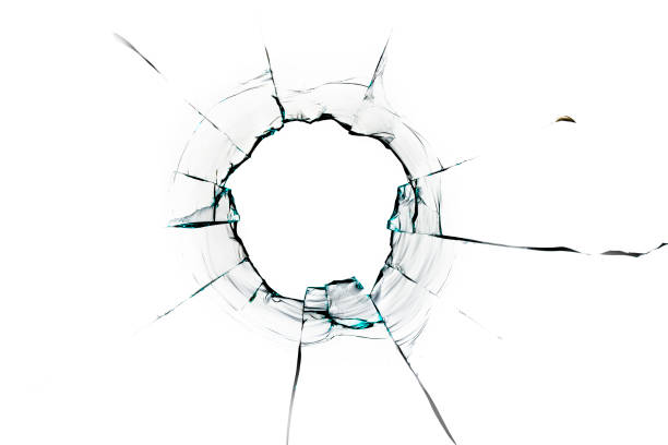 istock glass crack hole from a ball on a white background 1200594489