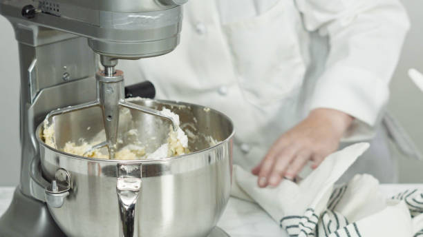 istock Mixing ingredients in standing kitchen mixer to bake sugar cookies. 1200595645