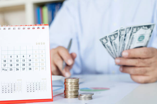 istock businessman working with documents and calculator 1200600872
