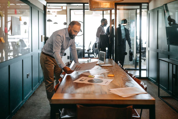 istock Businessman preparing reports for business plan 1200606164