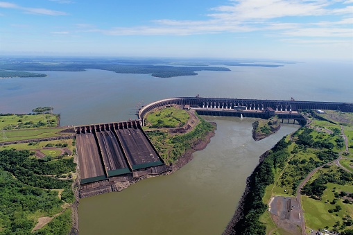 Aerial view of Itaipu's Dam, Foz do Iguaçu, Paraná, Brazil. Great landscape. Energy generation. Hydroelectric scene.